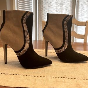 High heel booties with snakeskin accent
